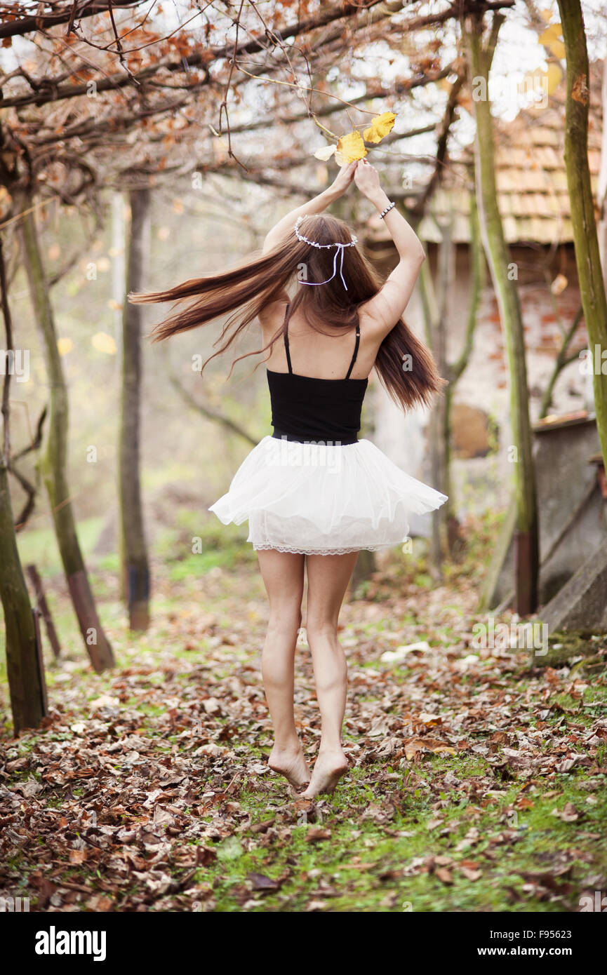 Outdoor portrait of beautiful girl in autumn forest Stock Photo - Alamy