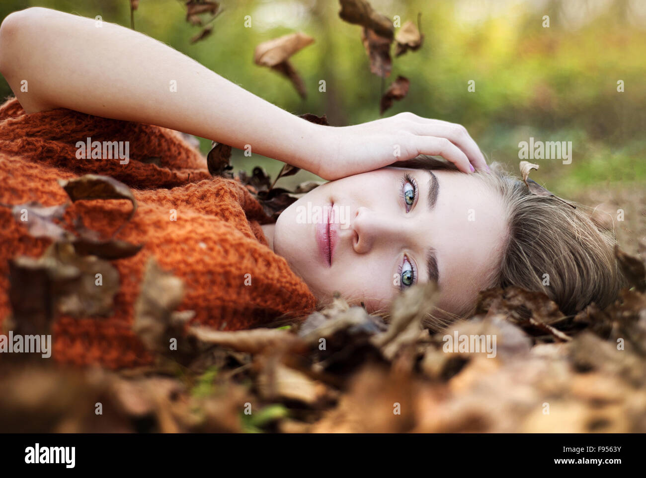 Outdoor portrait of beautiful girl in autumn forest Stock Photo - Alamy