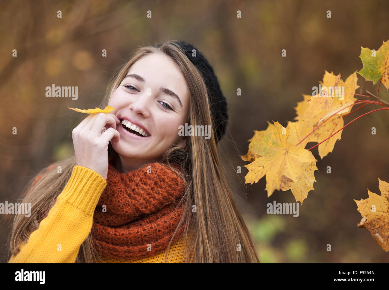 Outdoor portrait of beautiful girl in autumn forest Stock Photo - Alamy
