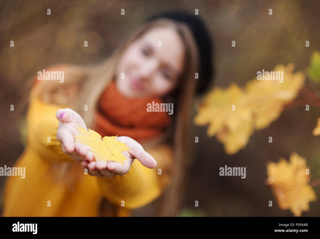Outdoor portrait of beautiful girl in autumn forest Stock Photo - Alamy