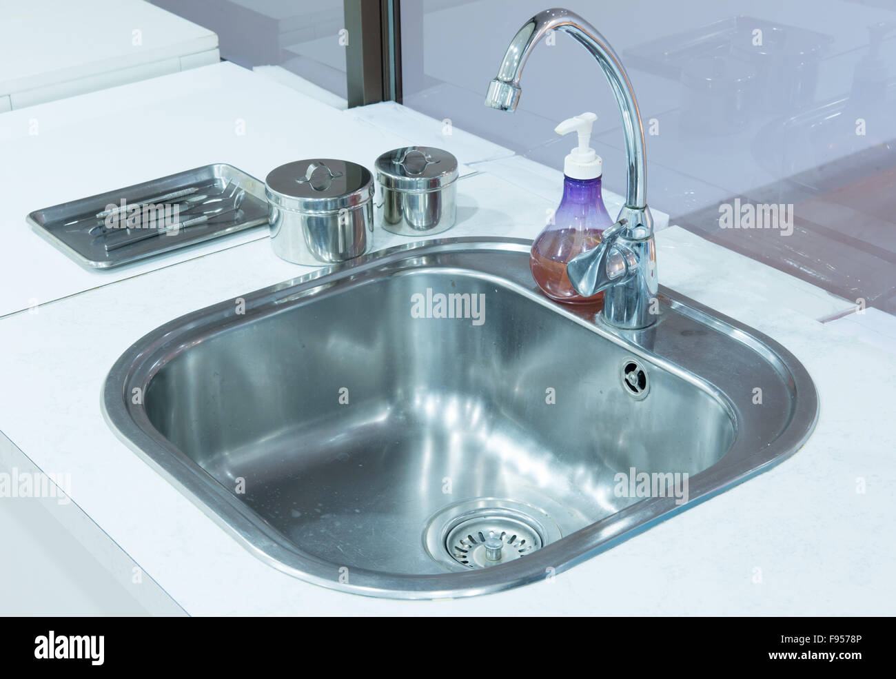 The sink in dental clinic Stock Photo - Alamy