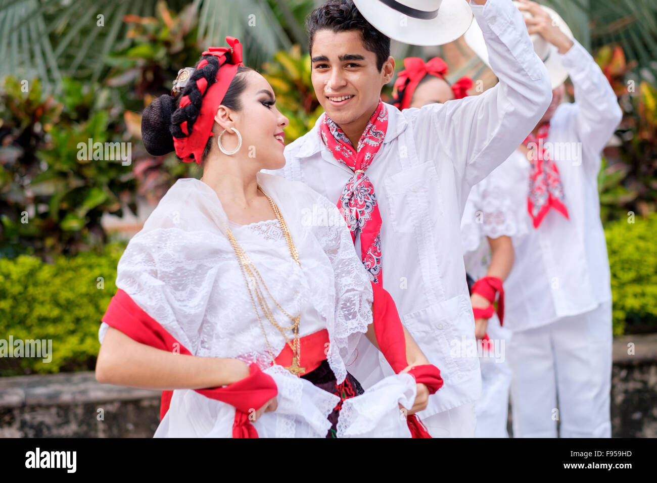 Young people in folkloristic costumes - Puerto Vallarta, Jalisco, Mexico. Xiutla Dancers - a folkloristic Mexican dance group in Stock Photo