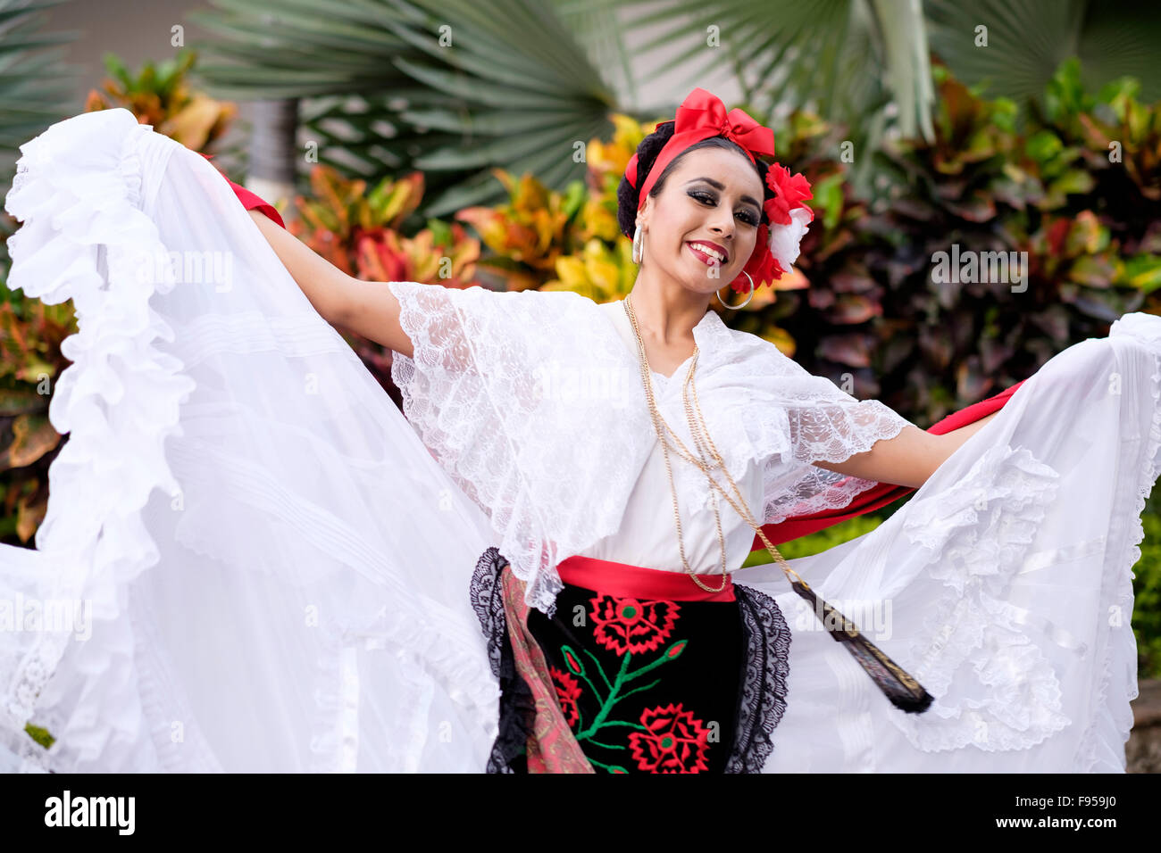 Woman dancing - Puerto Vallarta, Jalisco, Mexico. Xiutla Dancers - a folkloristic Mexican dance group in traditional costumes re Stock Photo