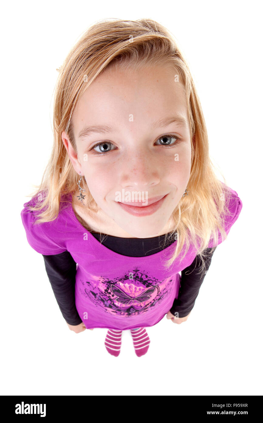 teenage girl in studio seen from above; big head little feet over white  background Stock Photo - Alamy