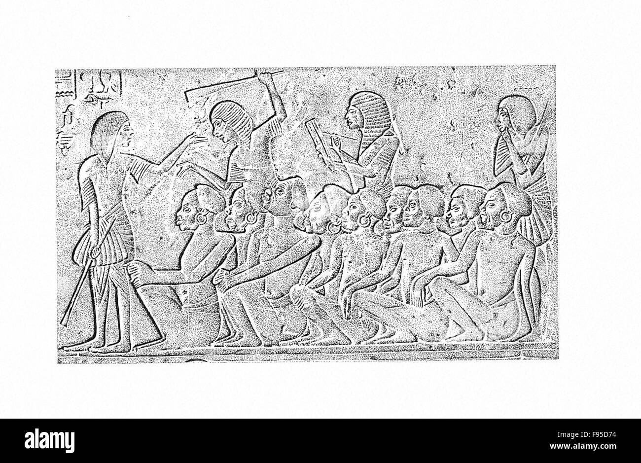 This relief shows African captives being beaten. Stock Photo