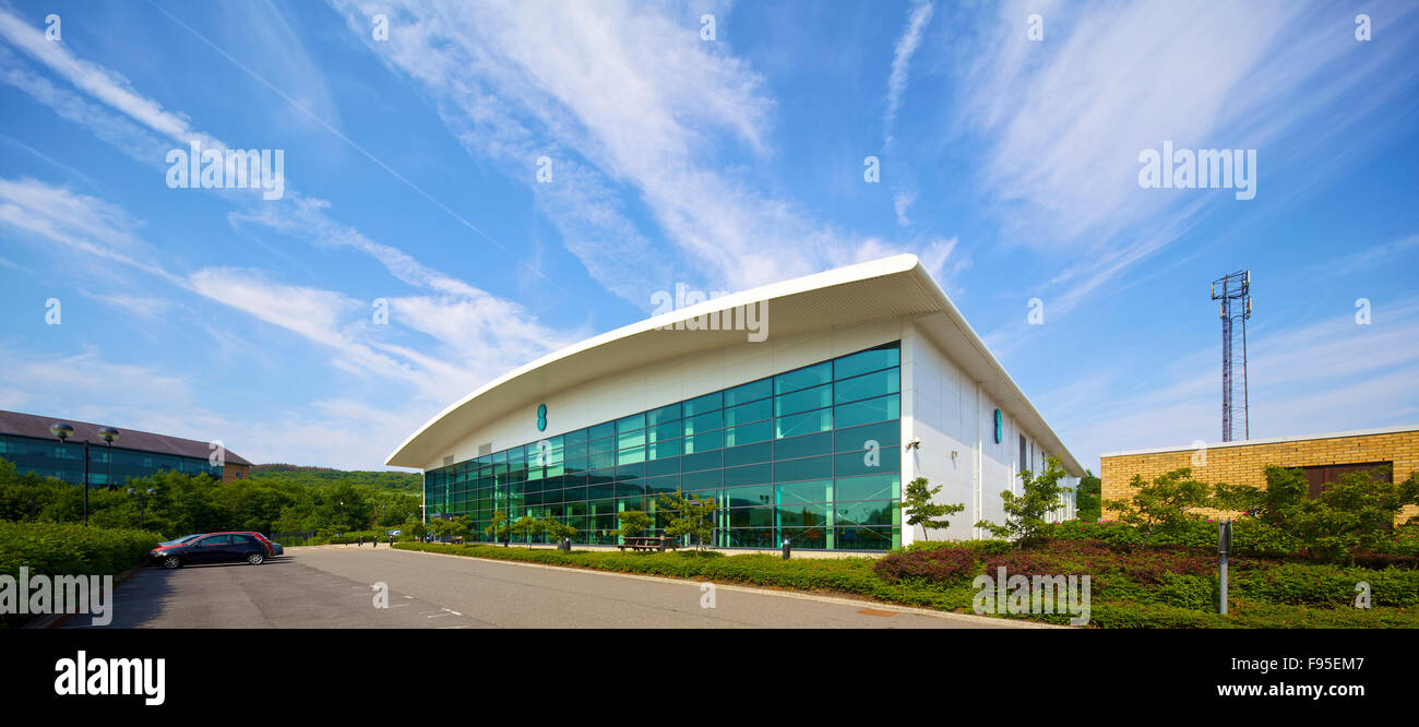 Everything Everywhere Office, Merthyr Tydfil. Exterior of office building and its car park.  Contemporary architecture with glass facade. Stock Photo