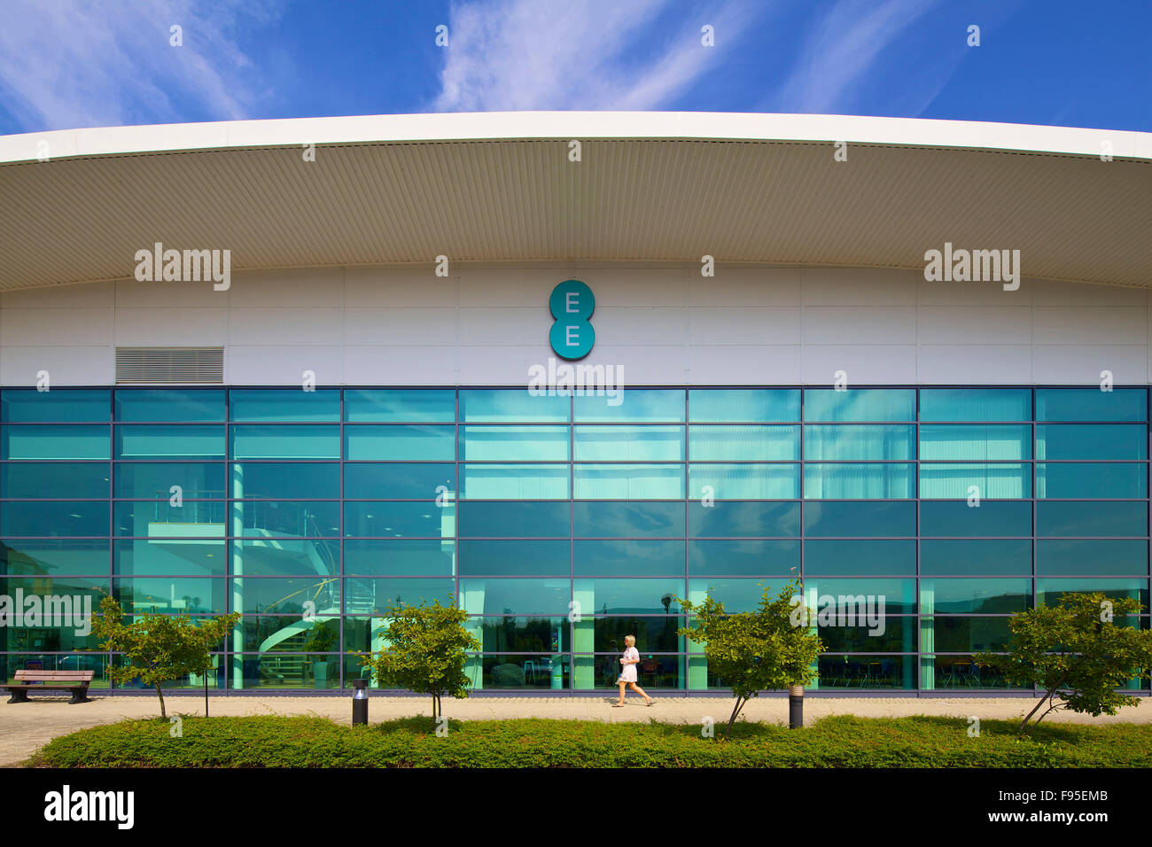 Everything Everywhere Office, Merthyr Tydfil. View of the building's exterior. Glass facade. EE sign hanging above the entrance. Stock Photo