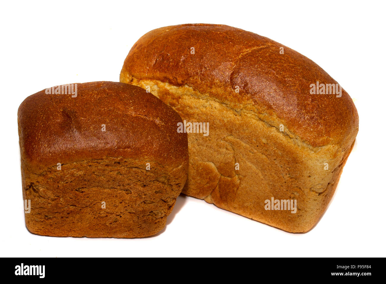 loafs of whole wheat and rye bread and isolated on white background ...