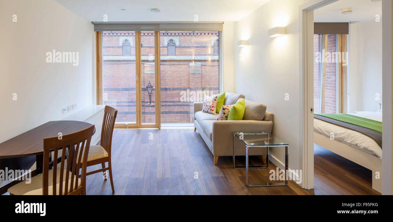 One Church Square, London, UK. View of a living area in modern apartment. Sliding glass door. Stock Photo