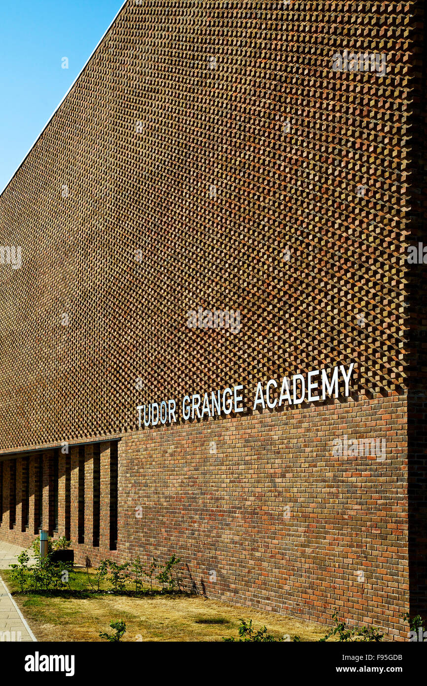 Tudor Grange Academy, Worcester. Close up view of the Tudor Grange Academy sign on the exterior wall. Stock Photo