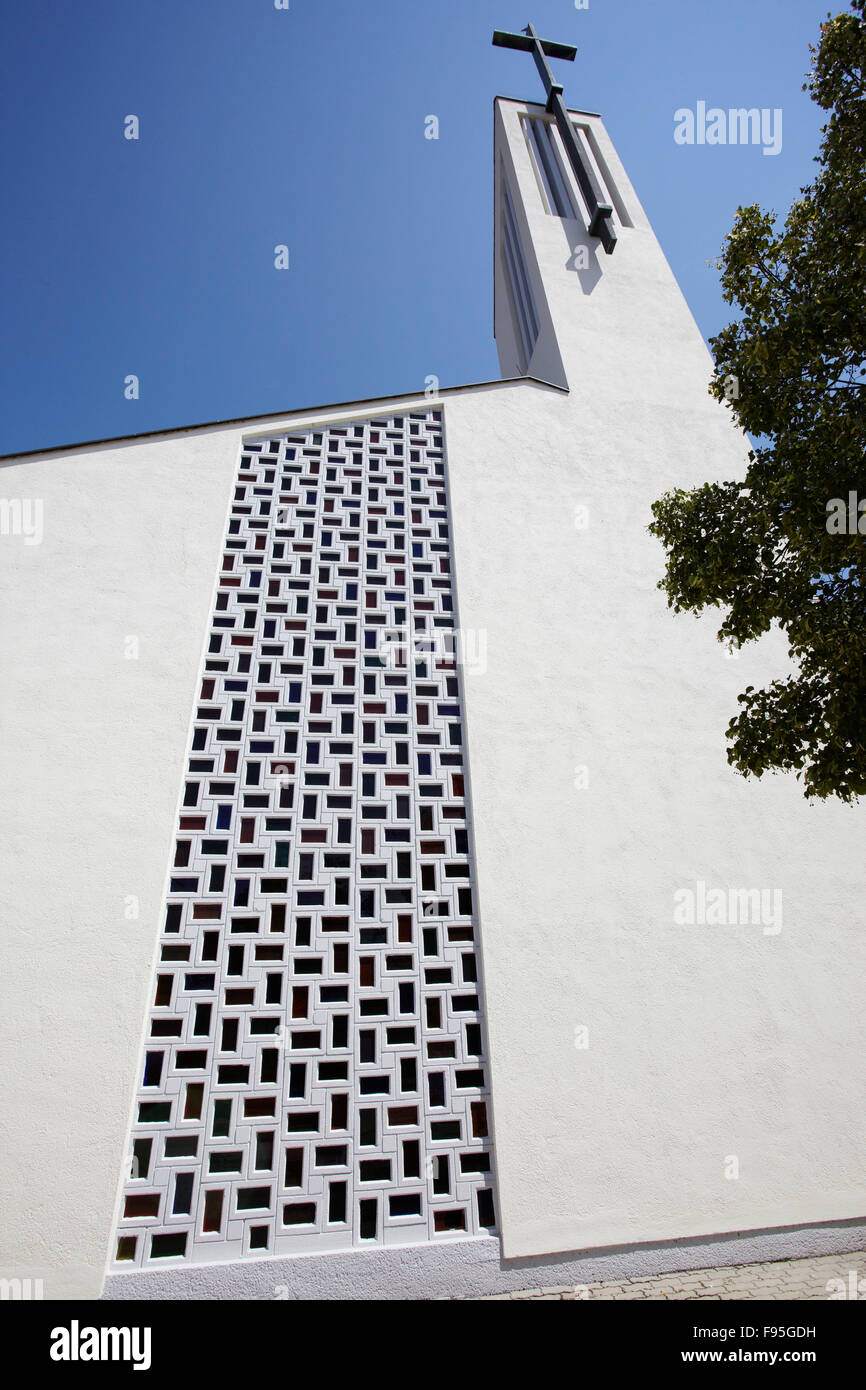 Kirche Stoob, Oberpullendorf, Burgenland. View of an exterior wall of the church in Oberpullendorf with a cut out panel  and a crucifix. Stock Photo