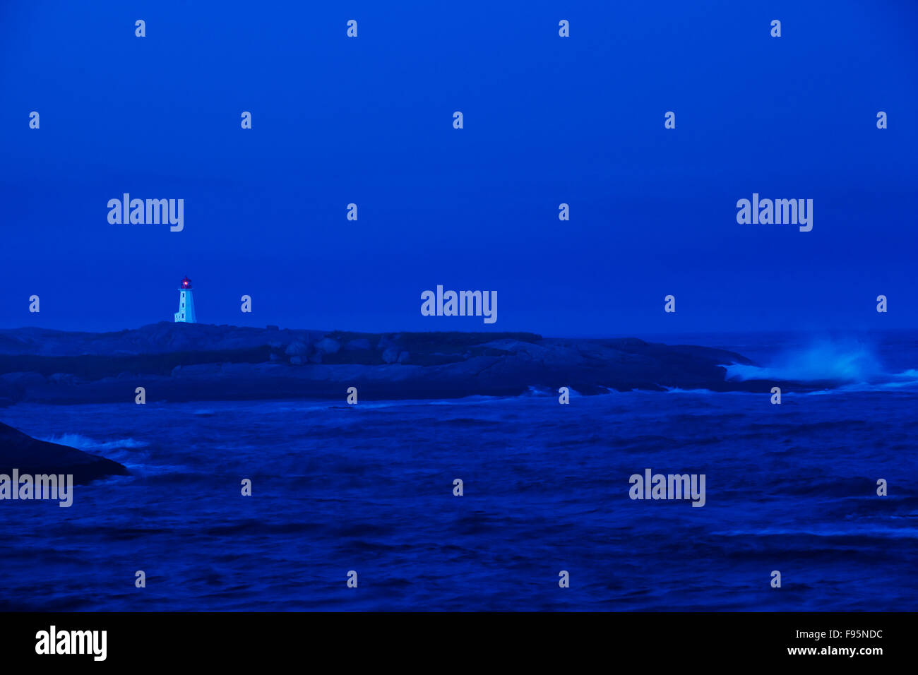 Peggy's Cove lighthouse in the first light of dawn. Stock Photo