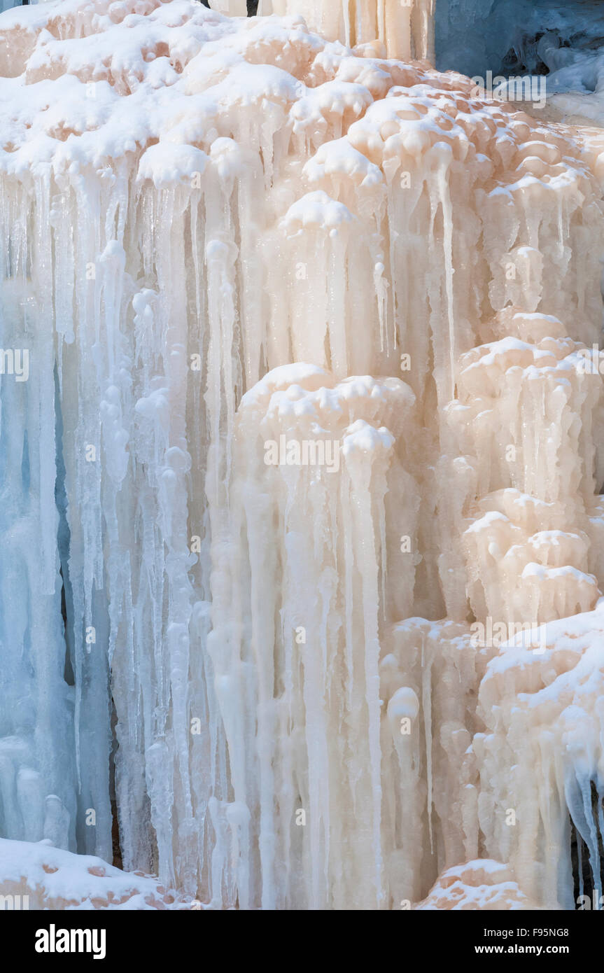 Frozen Tiffany Falls, detail.  Colouration is caused by contaminants in the ice.  Ancaster, Ontario, Canada Stock Photo