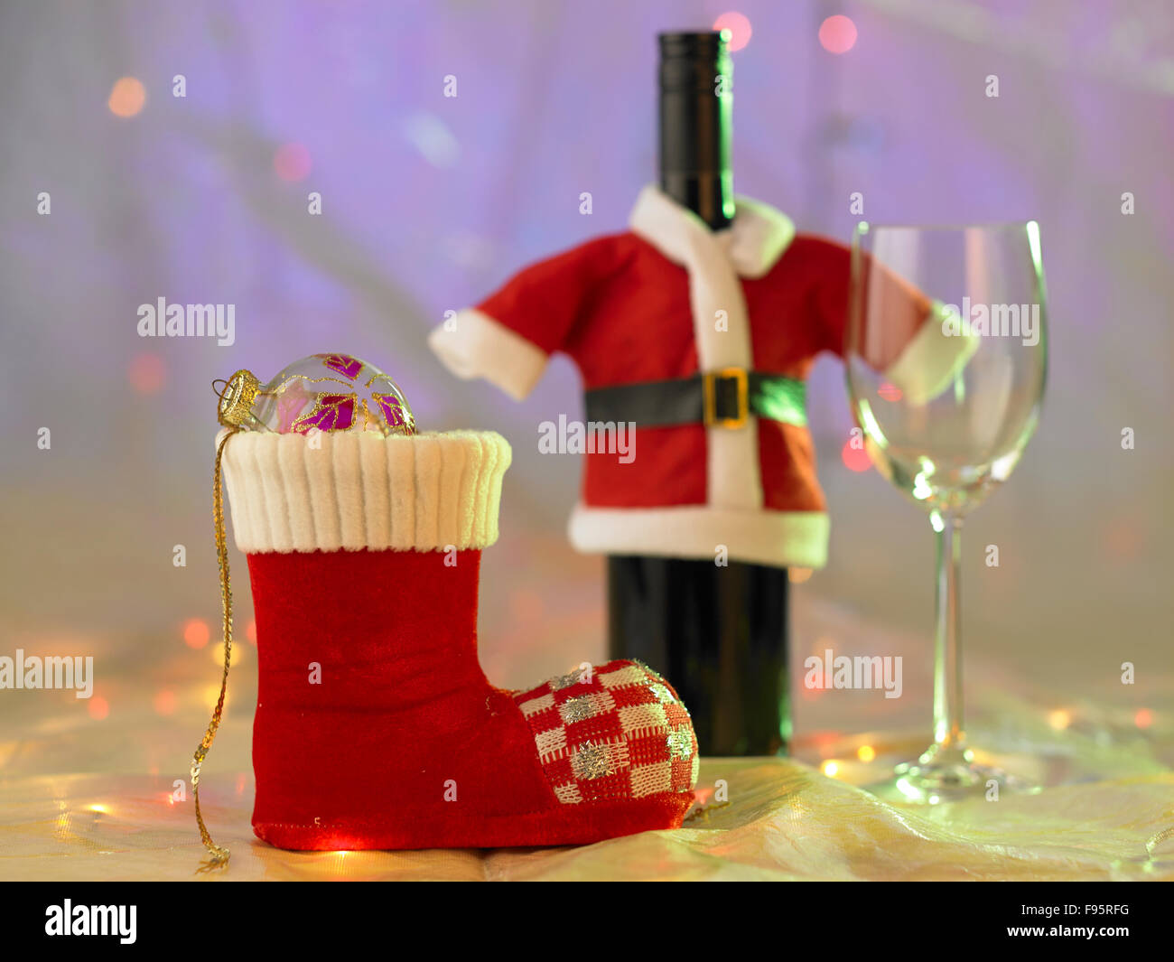 Santa Boot Wine Glass And Wine Bottle With Santa Claus Costume Stock Photo Alamy