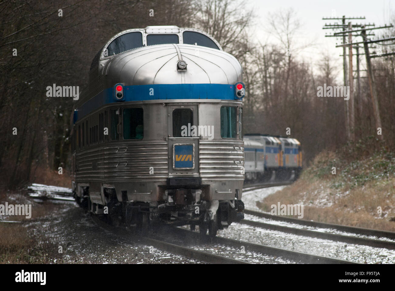 The VIA Rail Canadian nears the end of its journey passing through Burnaby, British Columbia, Canada Stock Photo