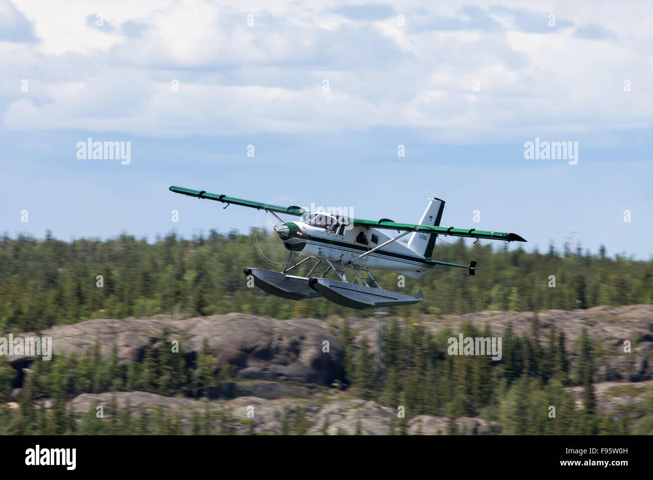 A Beaver floatplane takes off from Yellowknife, Northwest Territories, Canada Stock Photo