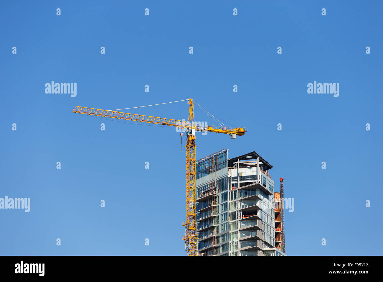 Crane, viewed from Granville Island, Vancouver, British Columbia. Stock Photo
