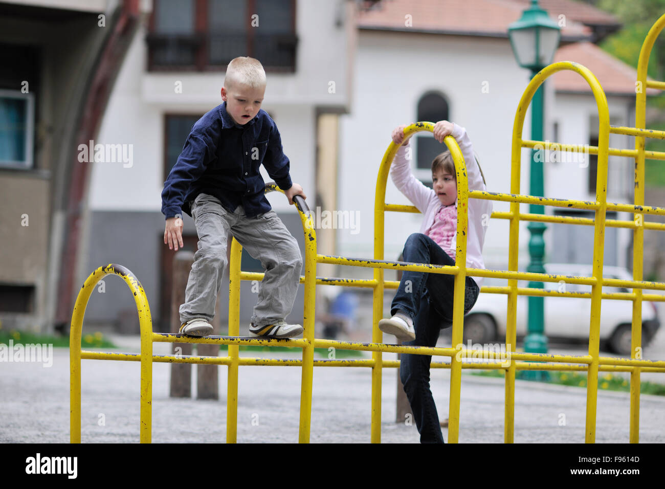 happy family sister and brother have fun and play games outdoor in park ...