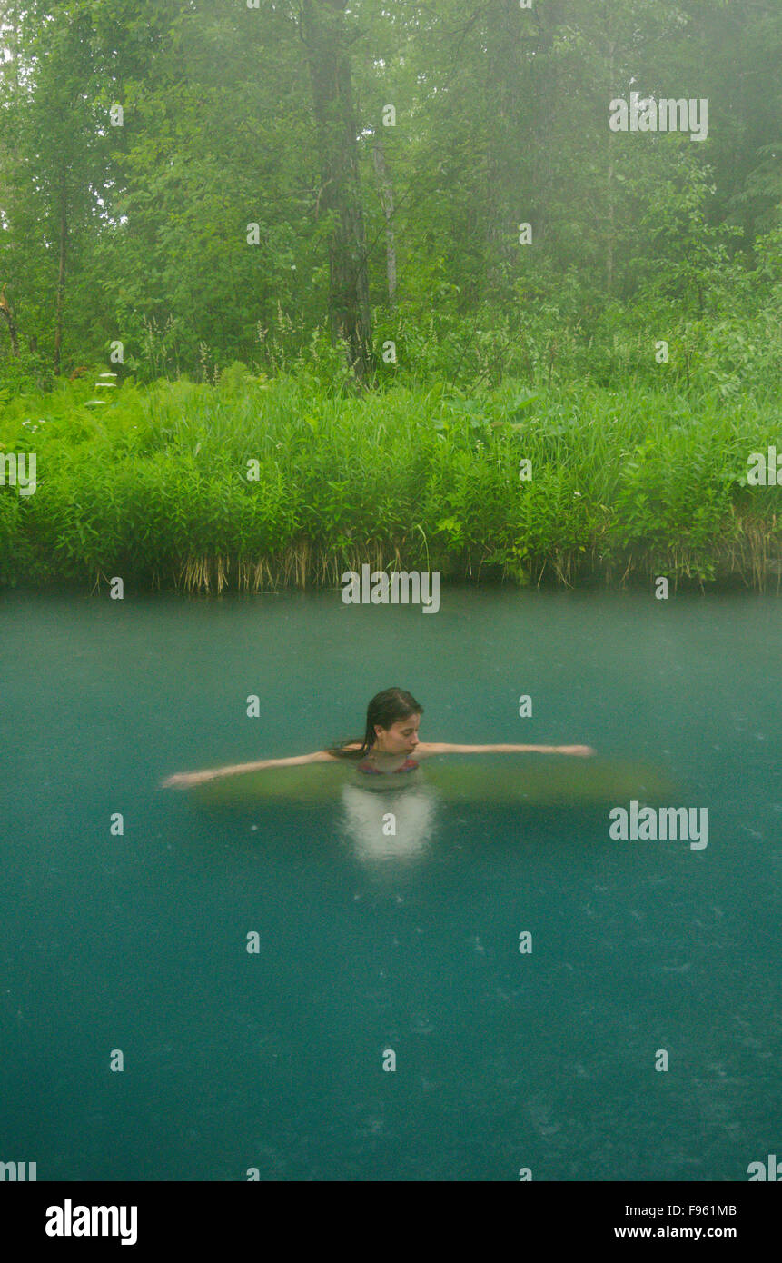 A female bather in the Liard River Hotsprings, Northern British Columbia, Canada Stock Photo