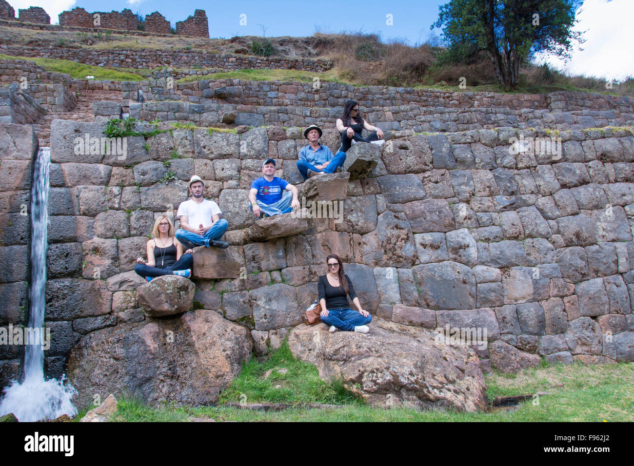 Travellers at Tipón, located east of Cusco, are Inca ruins, Peru Stock Photo