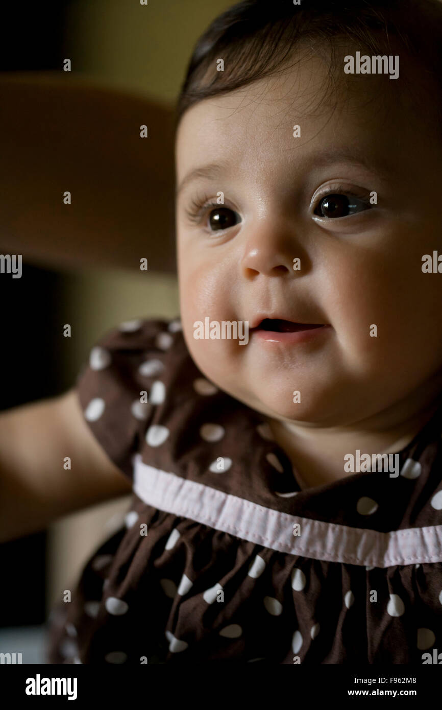 Portrait of a brown haired baby girl in her family's home in California. Stock Photo