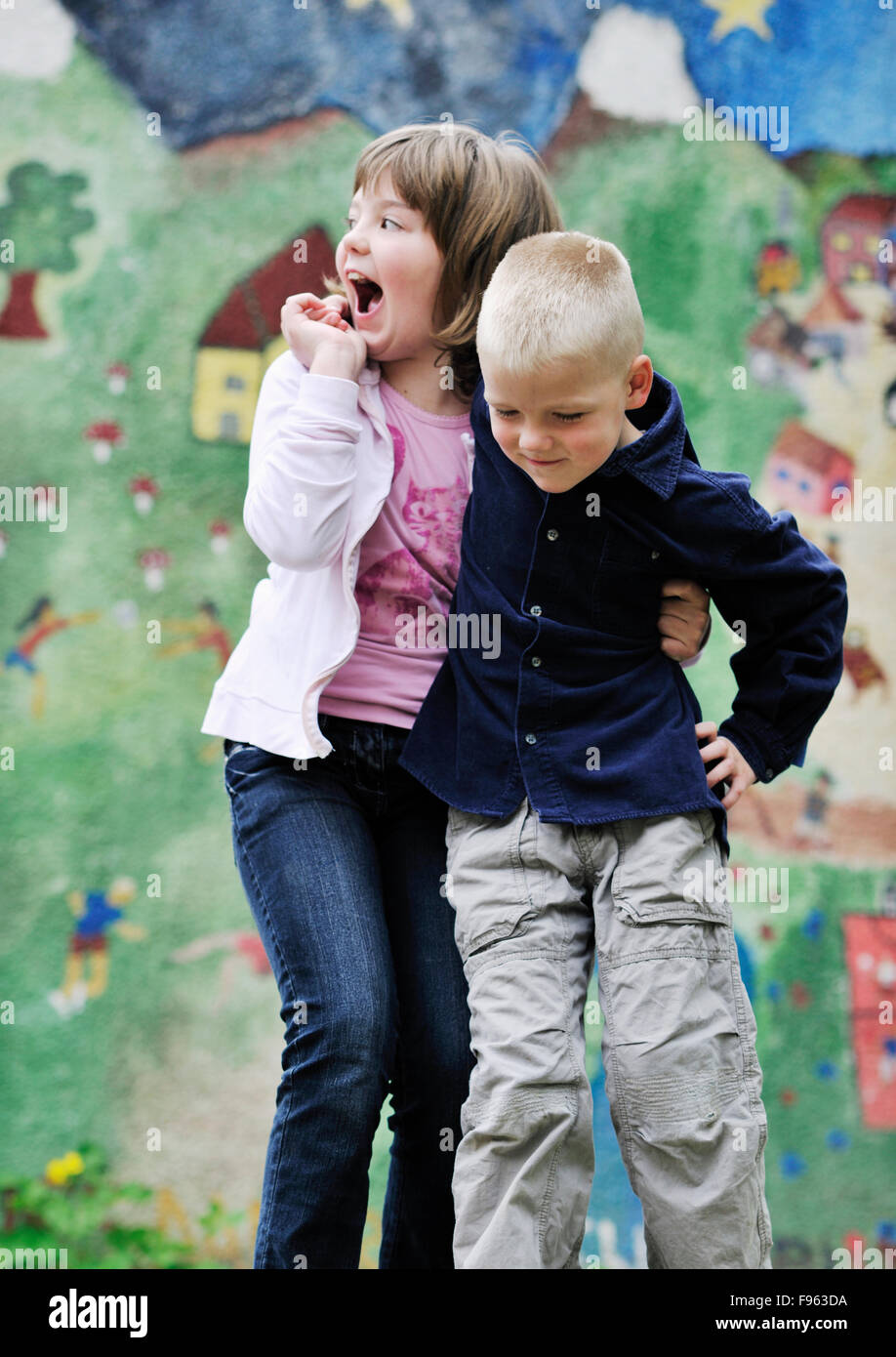happy family sister and brother have fun and play games outdoor in park  Stock Photo - Alamy