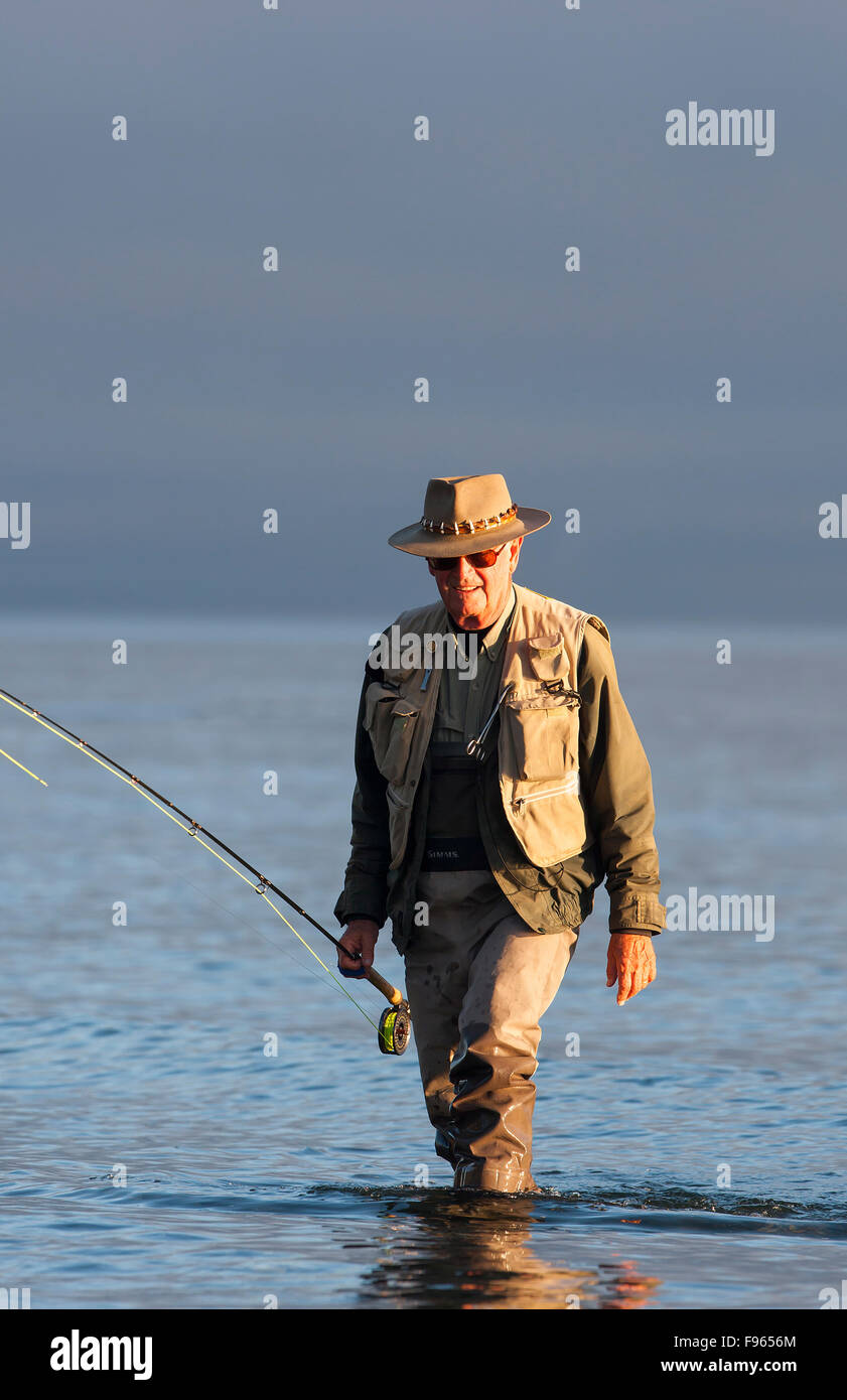Two fly fishing buddies discuss the fishing while at Cluxewe Resort