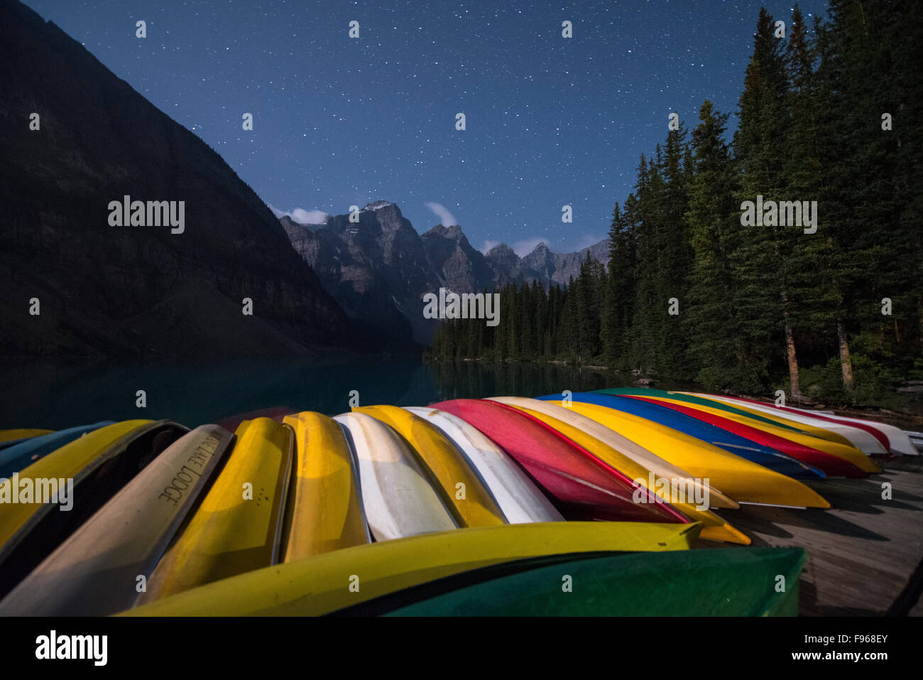 Canoes On Moraine Lake At Night Banff National Park Alberta Canada