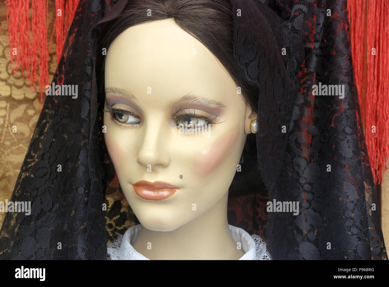Sweet window mannequin in original Spanish dress Stock Photo Alamy