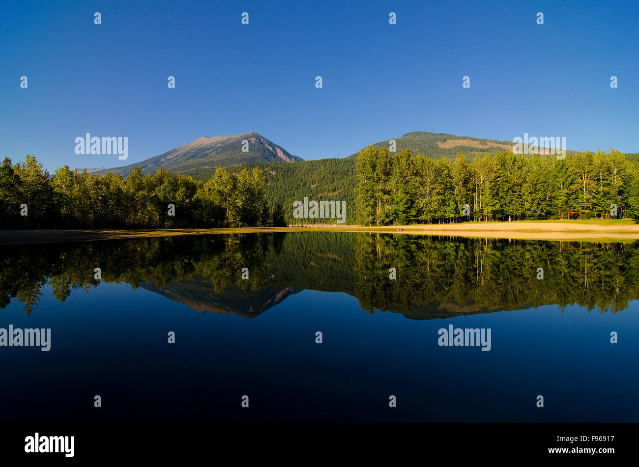 The swimming lagoon and surrounding mountains of Blanket Creek