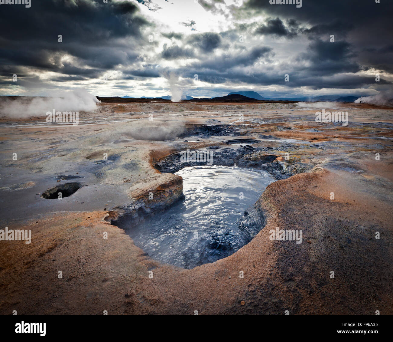 Geothermal hot springs, Hverarond, Namaskard, Iceland. The area is characterized by boiling mud-bogs and solfataras. Stock Photo