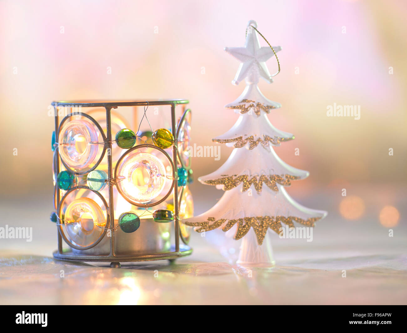 colorful light holder with mini christmas tree ornament Stock Photo