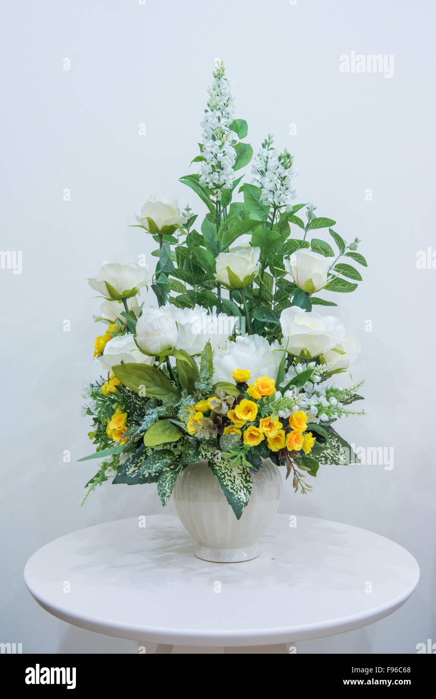 Artificial flowers in flower vase hires stock photography and images