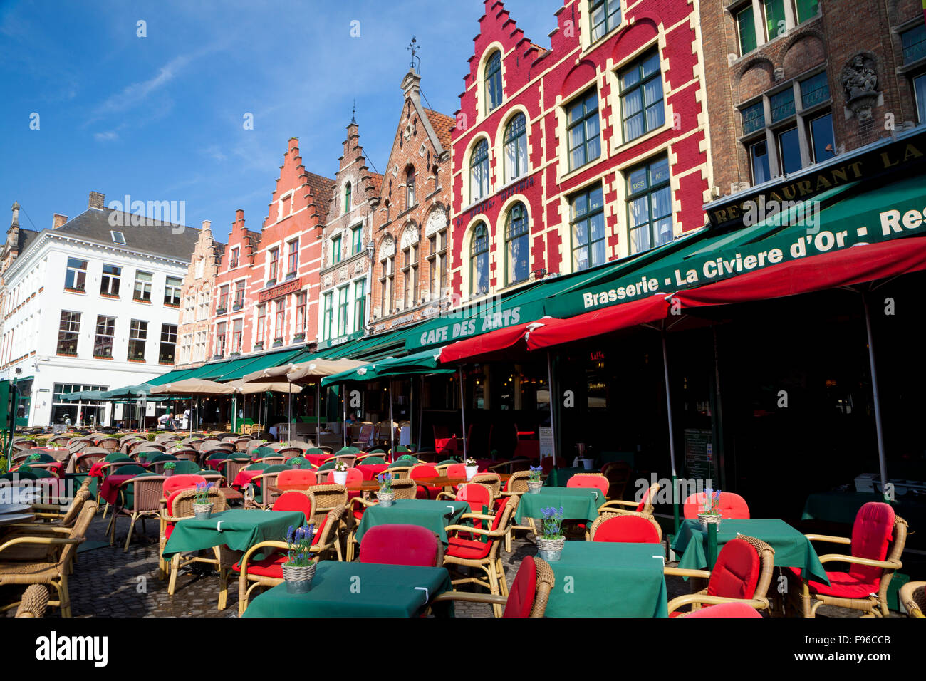 Historic Buildings, Outdoor Restaurants and Cafes surrounding Market Square, Bruges, Belgium Stock Photo