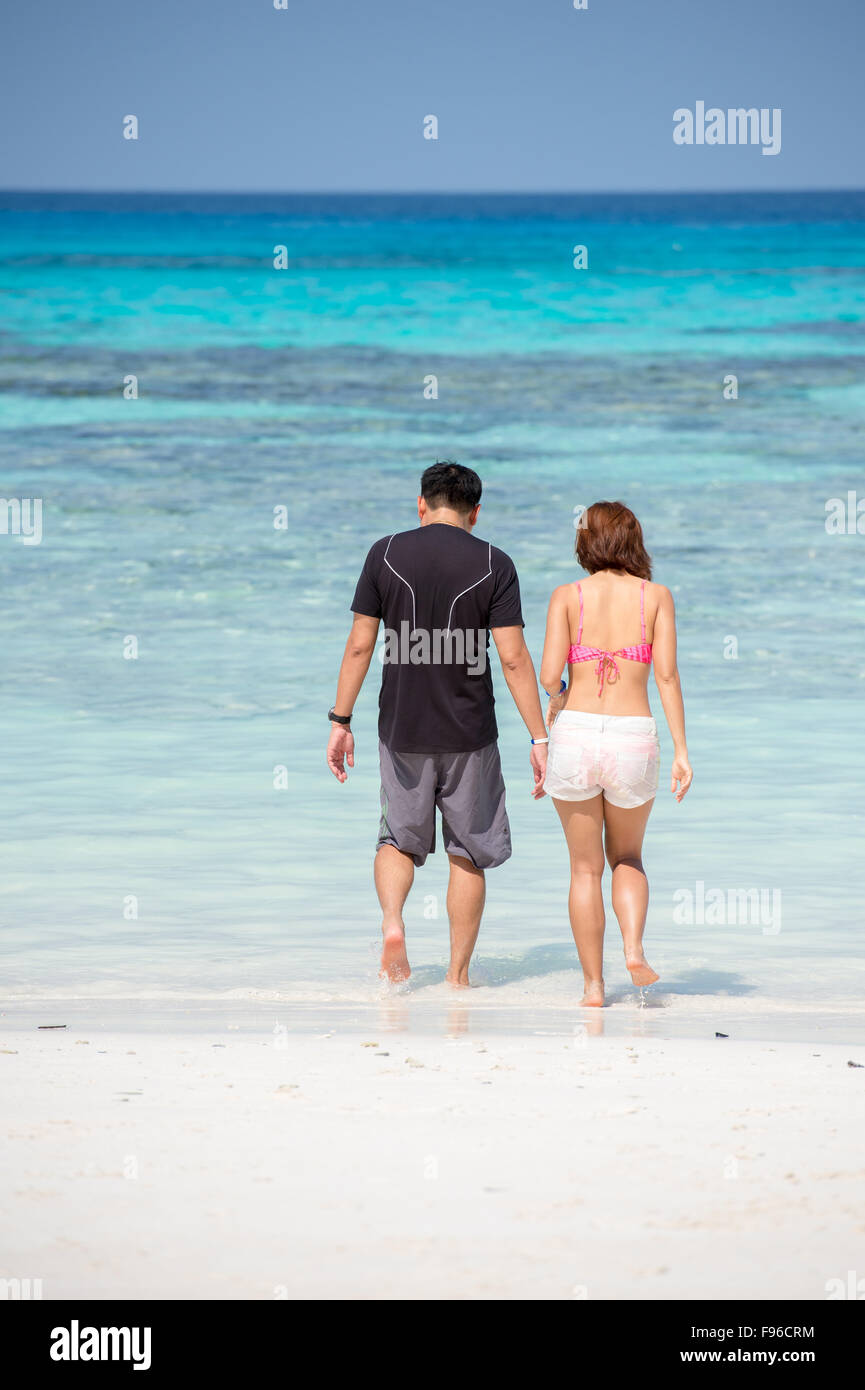 Man and woman on koh tachai beach Stock Photo