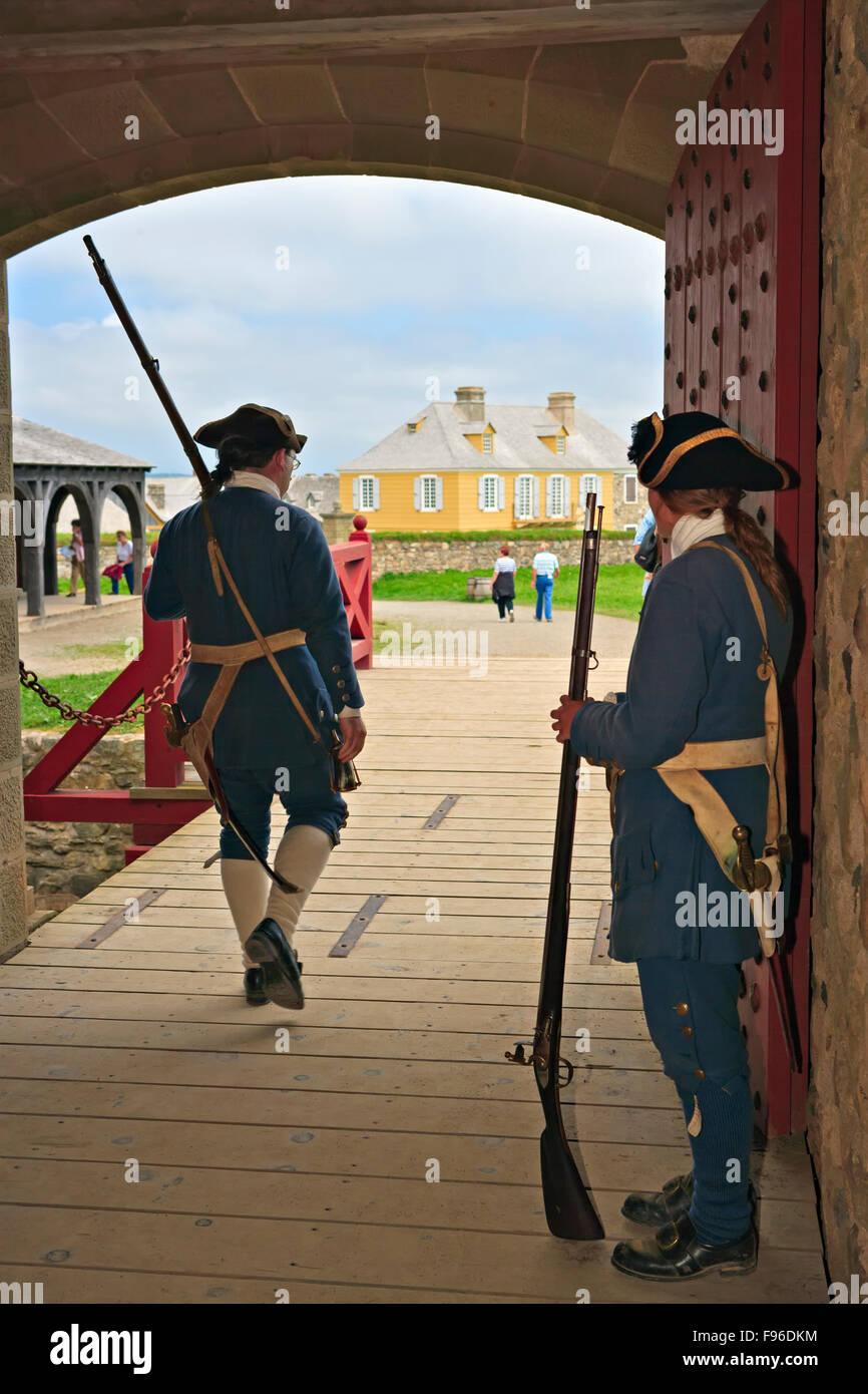 Soldiers at the entrance to the King's Bastion at the Fortress of Louisbourg, Marconi Trail, Cape Breton, Nova Scotia, Canada. Stock Photo