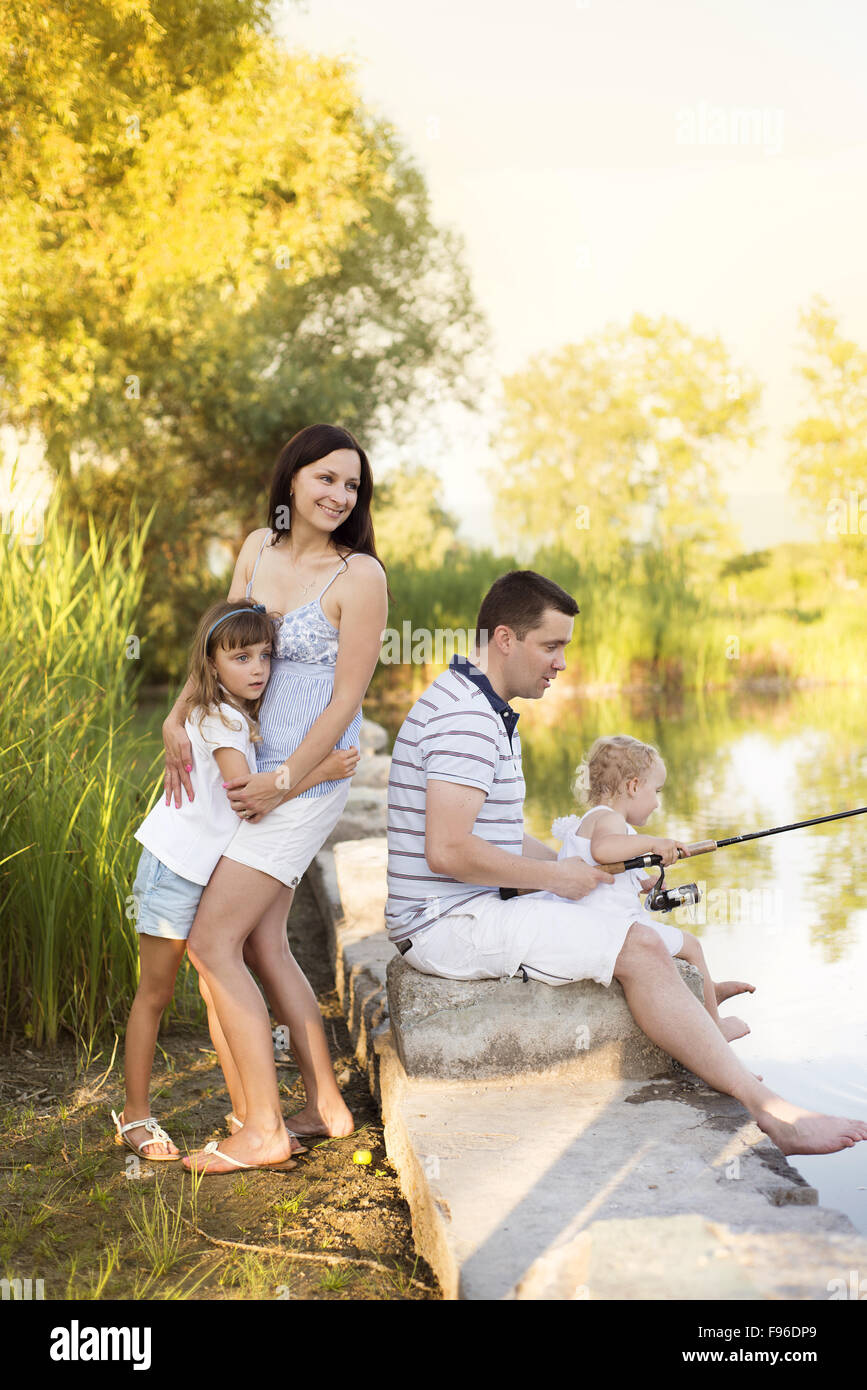 Fishing kids water pole hi-res stock photography and images - Page 2 - Alamy