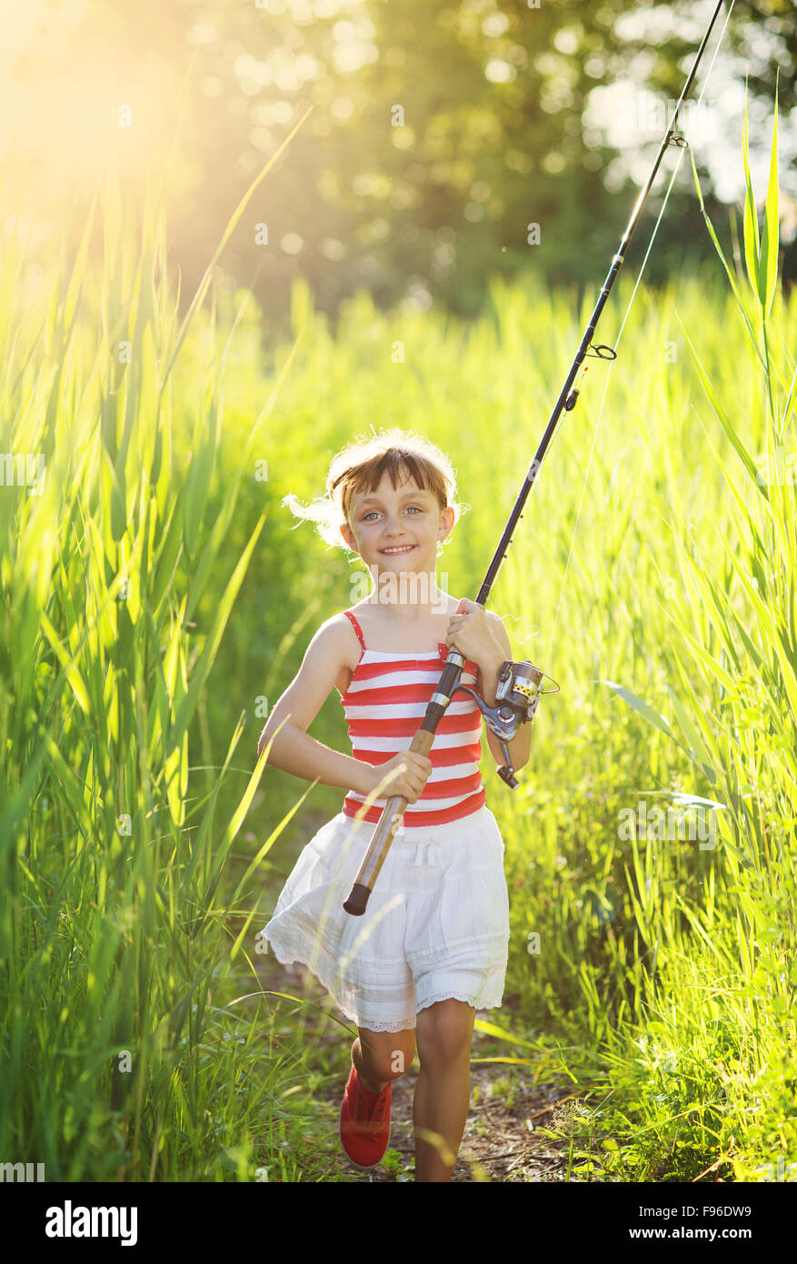Cute little girl is ready to go fishing Stock Photo Alamy