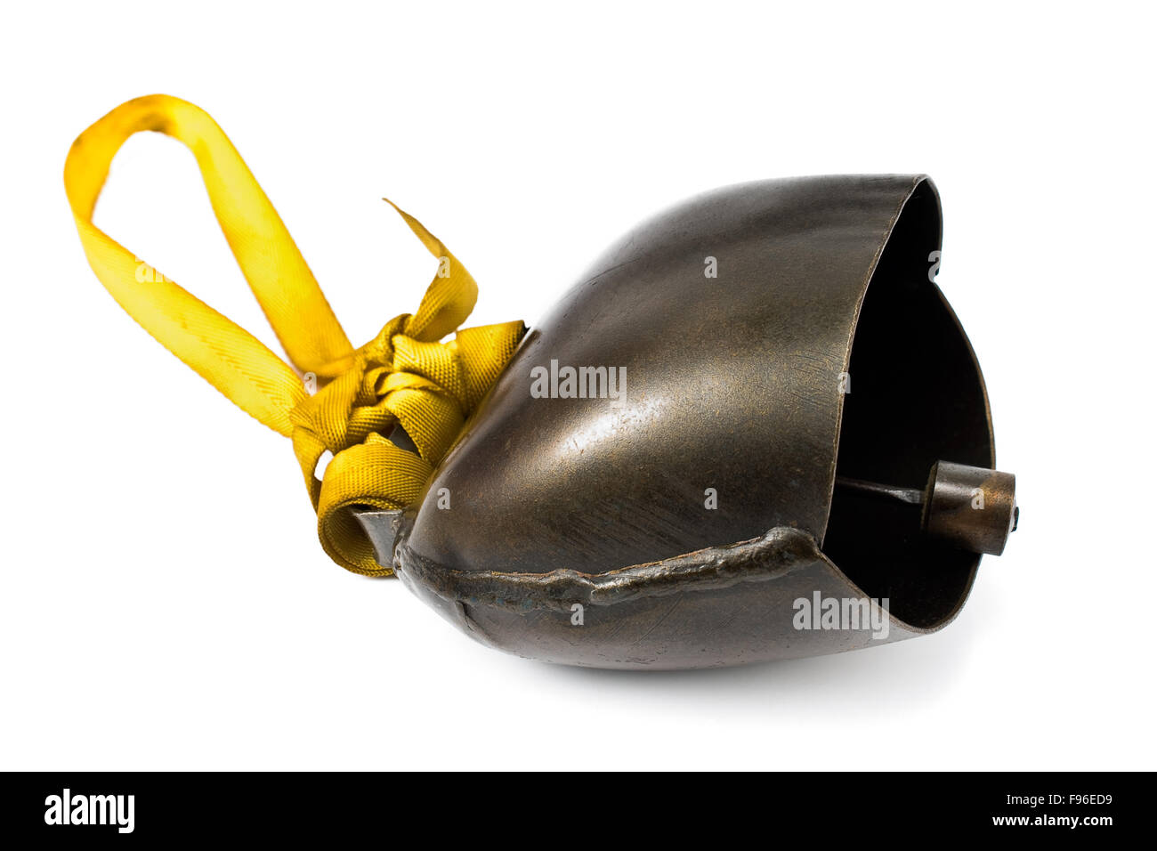 Alps cowbell with yellow strap isolated on white Stock Photo