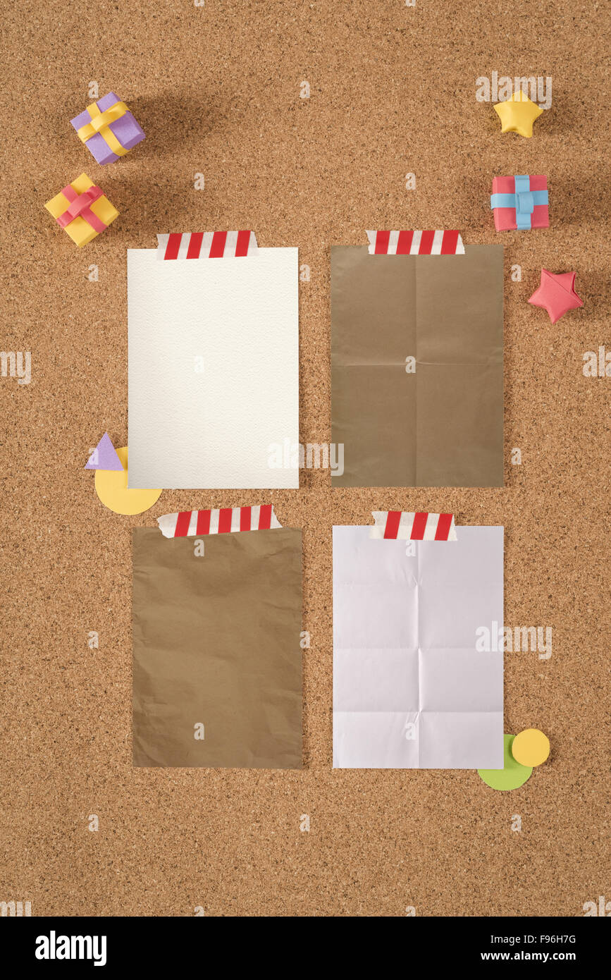 Paper texture notes template on cork notice board background with colorful cute handmade elements, including clipping path. Stock Photo