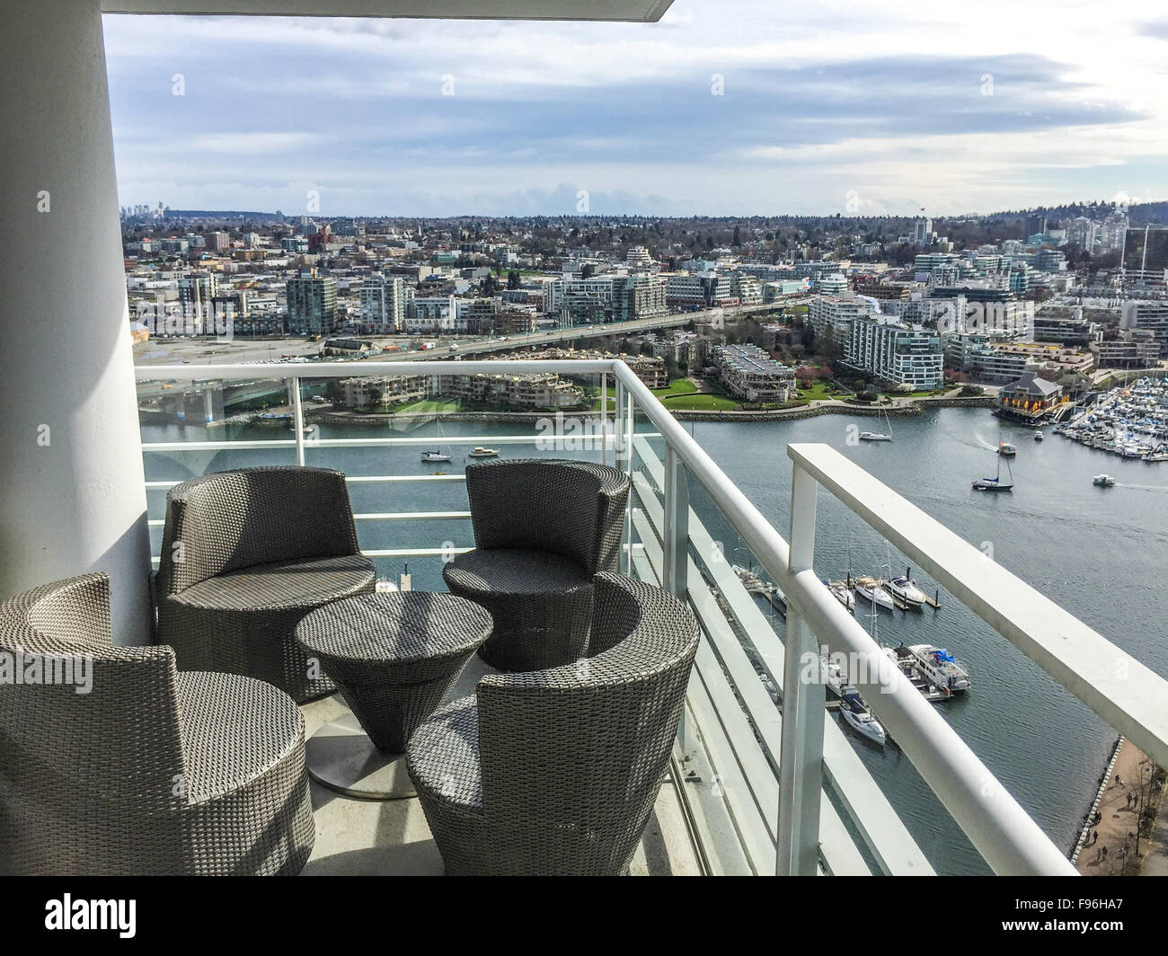 Highrise deck with view of water. Stock Photo