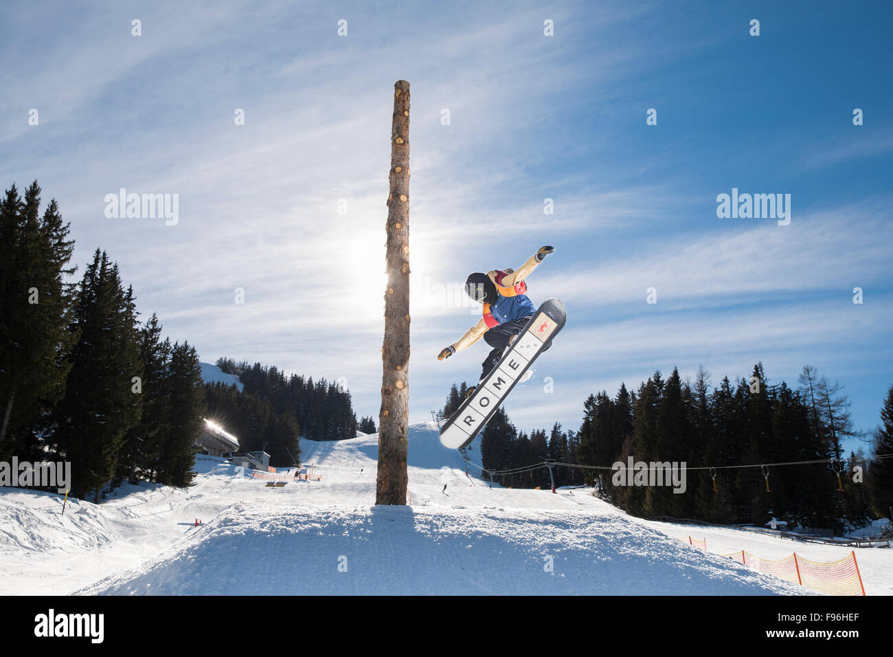 Teenage snowboarder jumping in a funpark, Muttereralmpark, Mutters, Tyrol, Austria Stock Photo