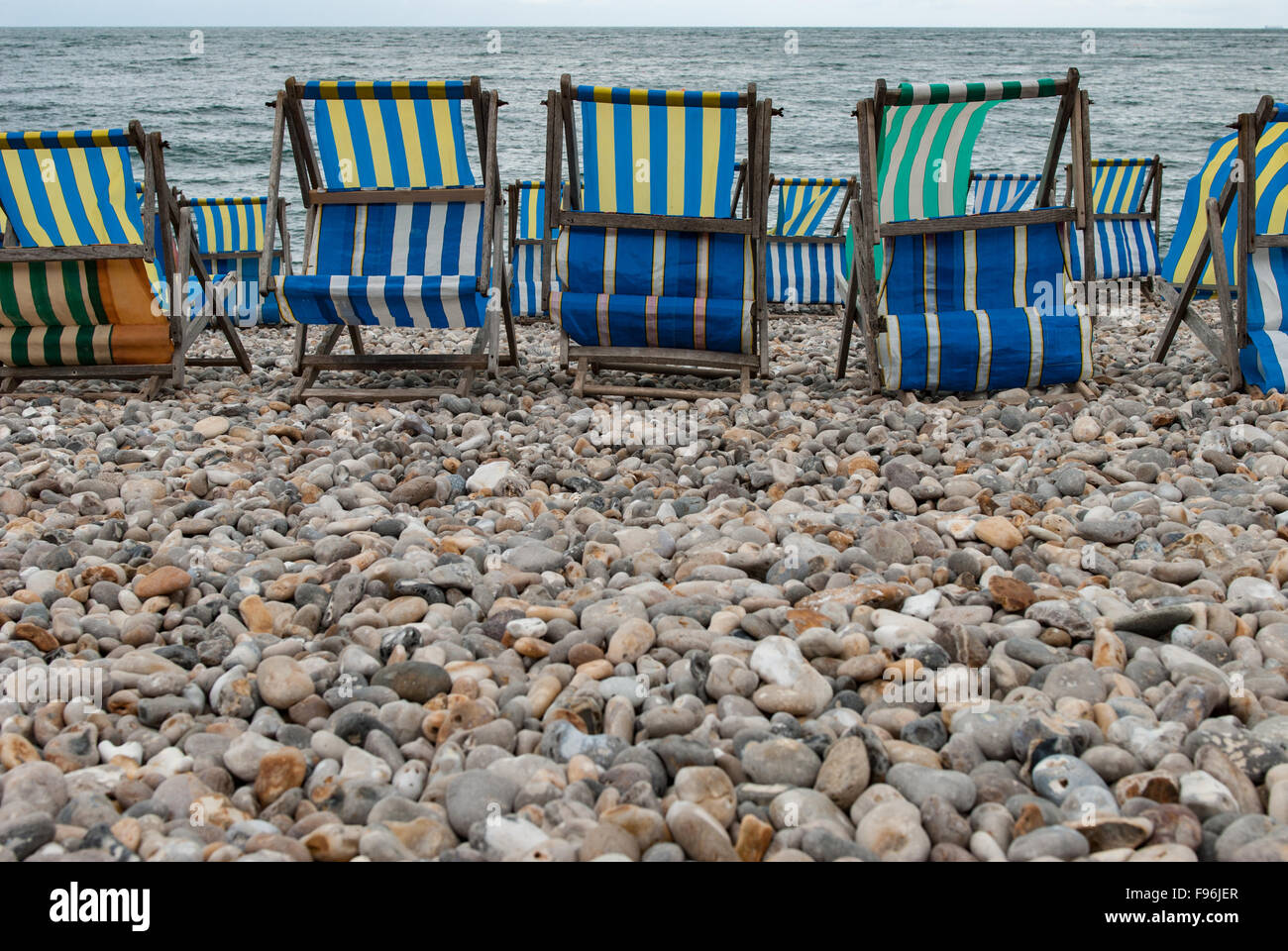 Striped fabric deck chairs hi-res stock photography and images - Alamy
