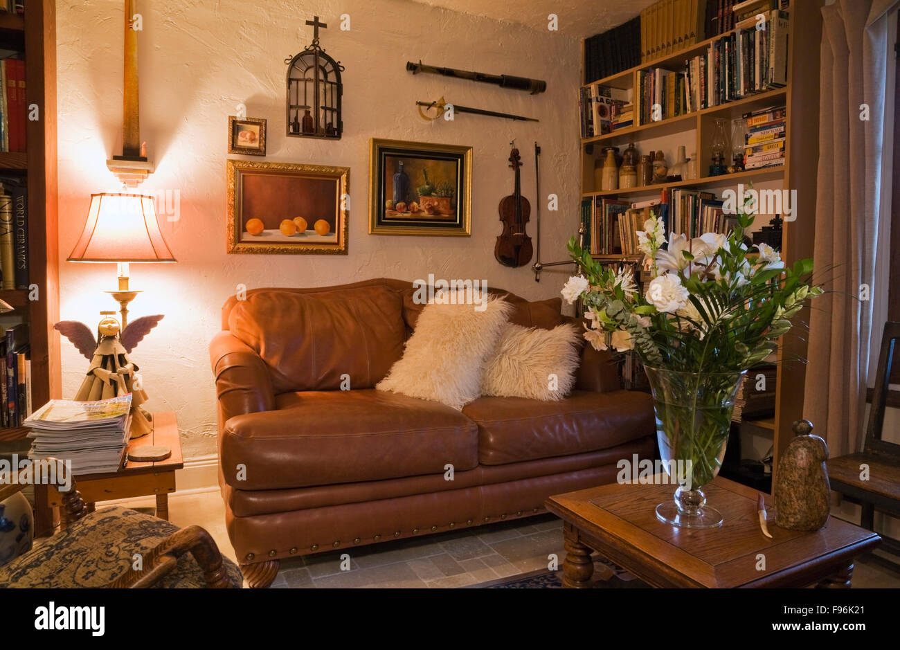 Brown Leather Sofa In The Reading Room Inside An Old 1809 Cottage