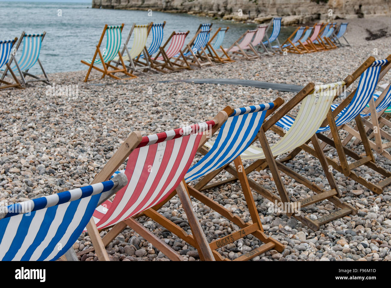 Striped fabric deck chairs hi-res stock photography and images - Alamy