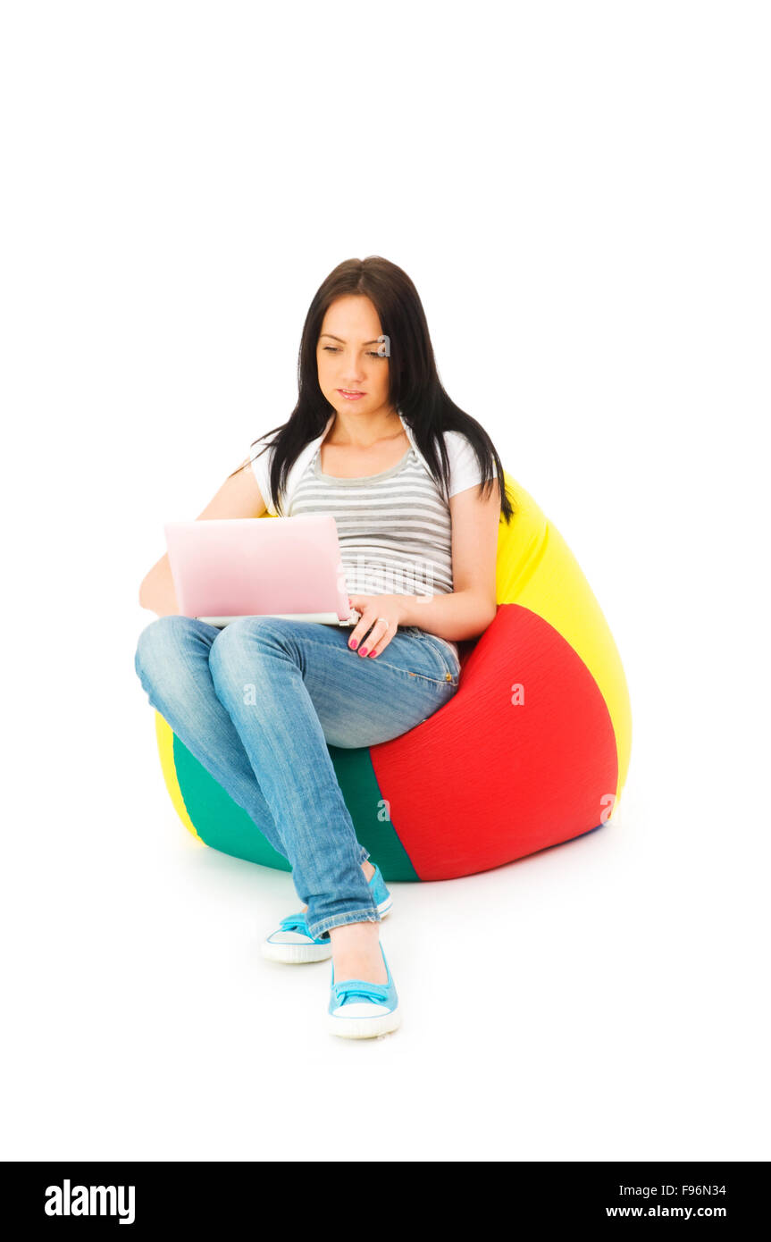 Girl working on laptop isolated on white Stock Photo - Alamy