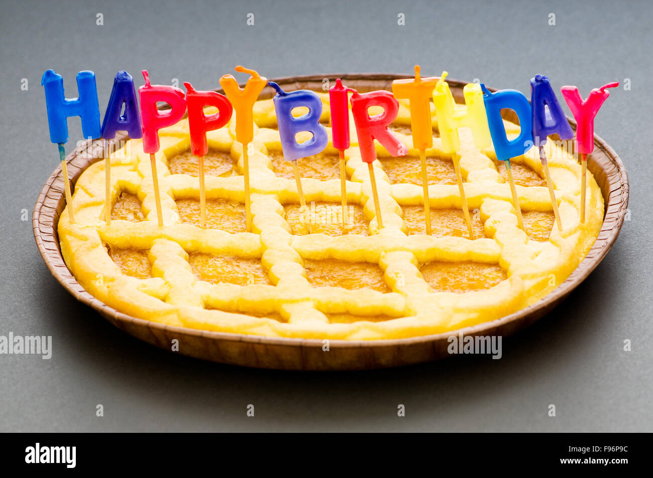 Happy birthday candles in the pie Stock Photo Alamy