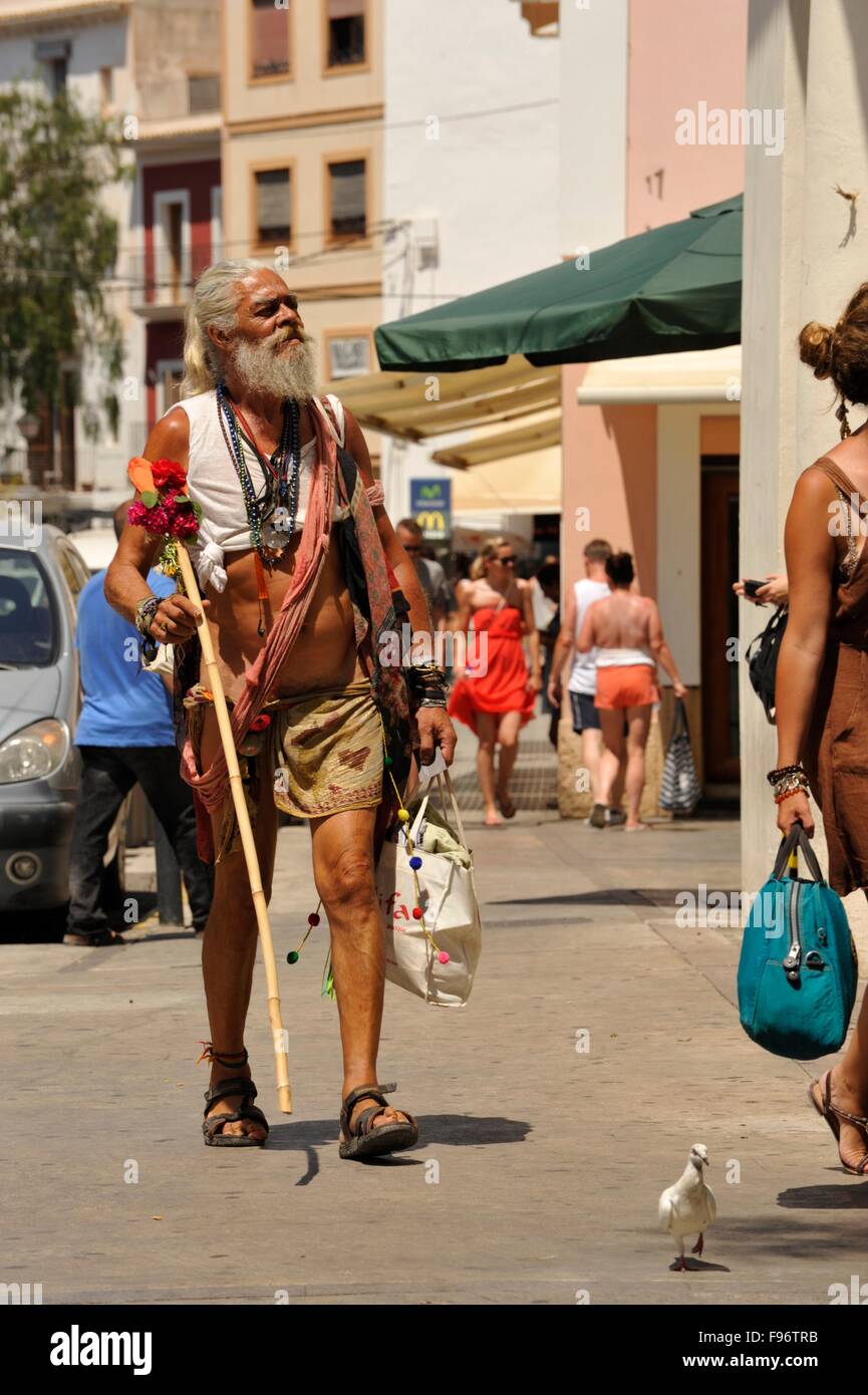 Old Hippy in Ibiza town Stock Photo