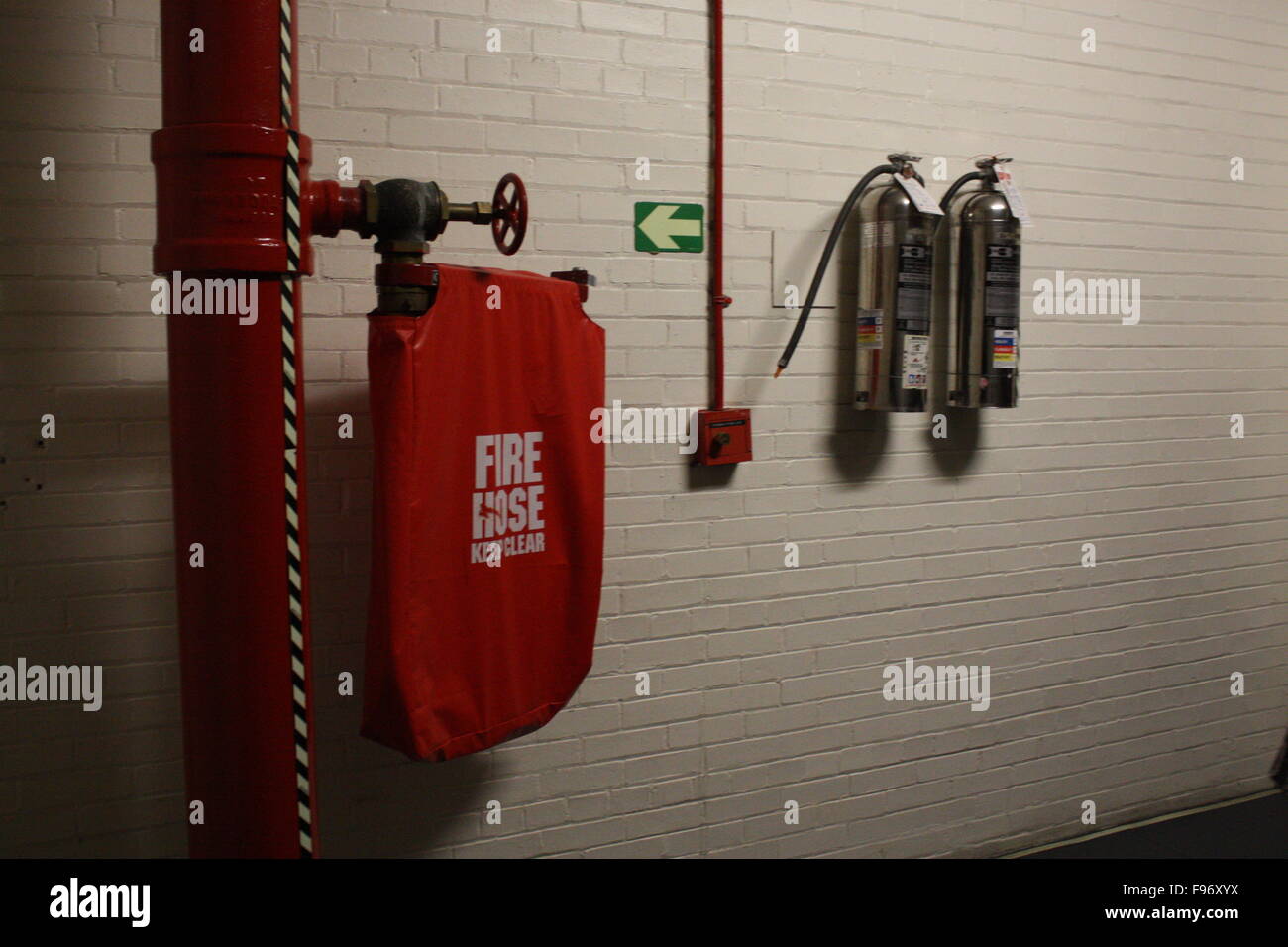 Fire Control And Safety Equipment Mounted On A Wall Stock Photo