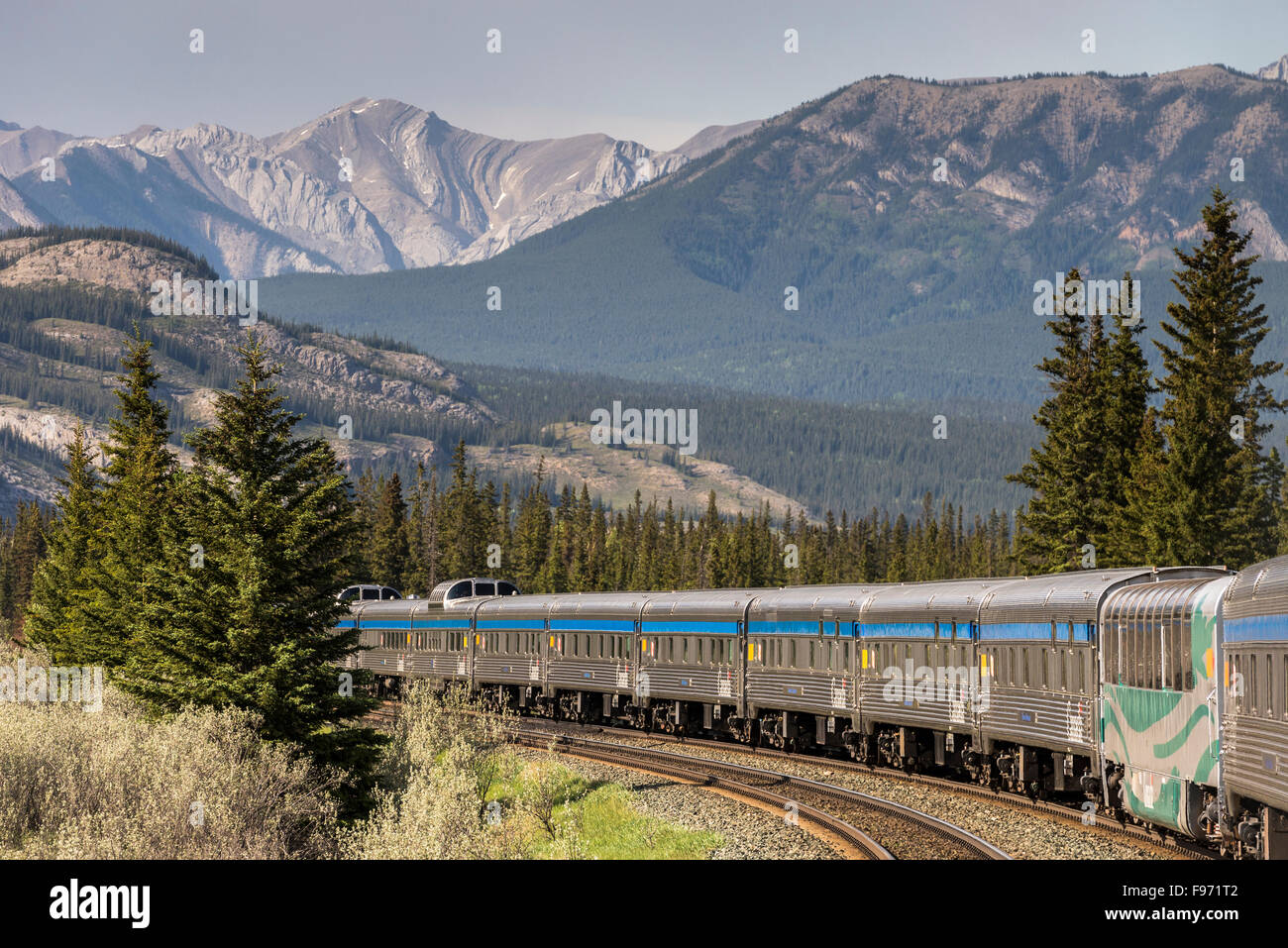 Passenger train going through the Rocky Mountains in Jasper National